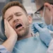 Patient with tooth pain during an emergency dental exam in Rexburg